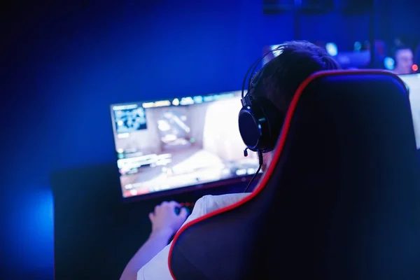 Neat single gaming station with keyboard and headset at TILT computer club